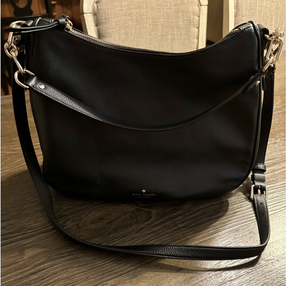 Kate Spade black leather purse. New, never used, no tags